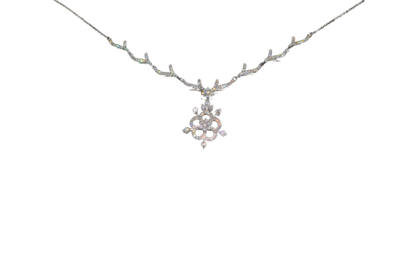 Sterling silver women’s necklace set with floral cubic zirconia pendant and matching earrings on a vine-inspired chain.