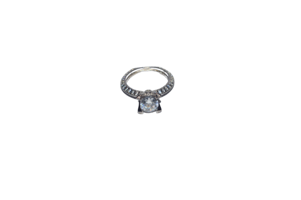 Sterling silver women’s ring with round-cut centerpiece stone and side stone accents along the band
