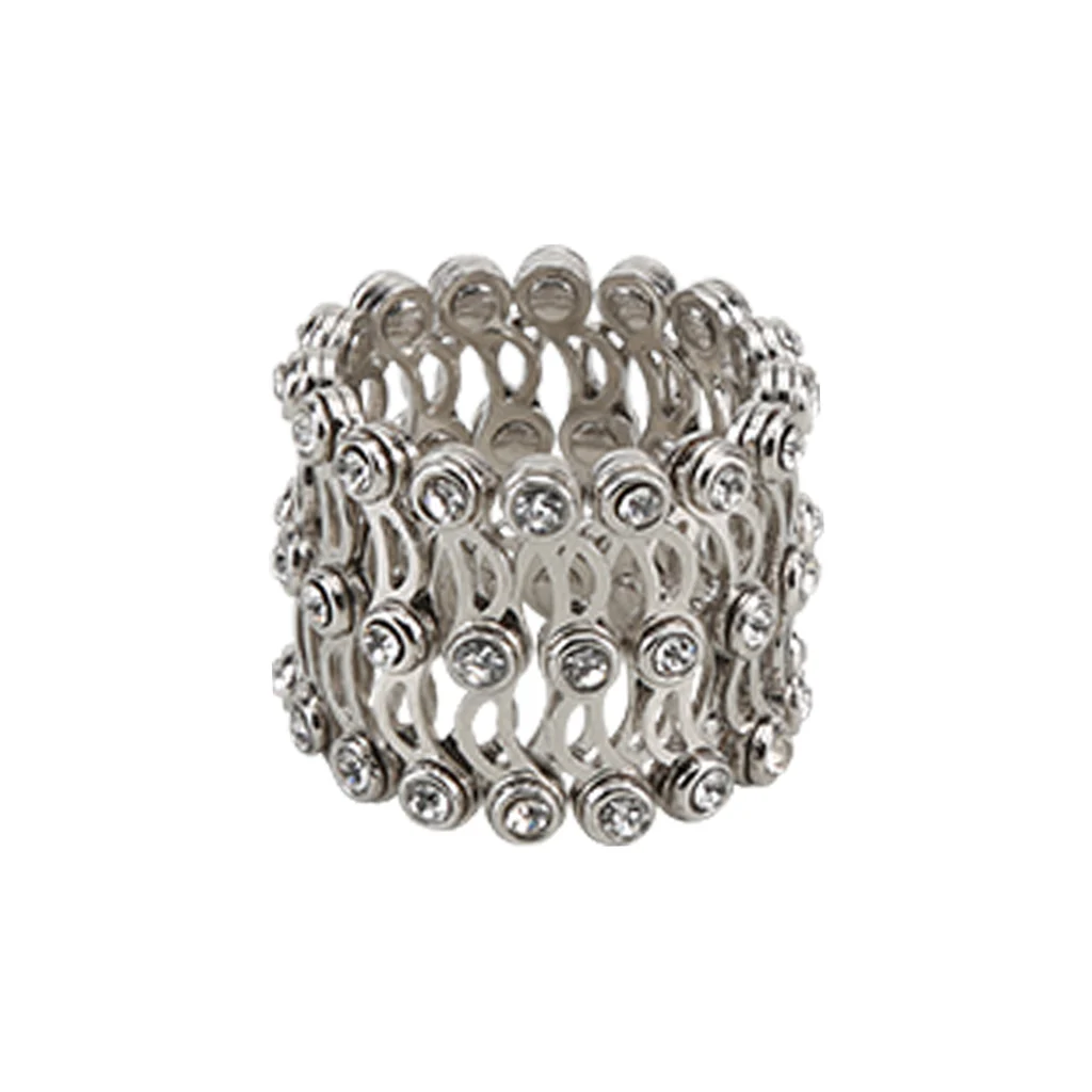 lose-up of a two-in-one silver jewelry piece, a ring and a bangle, featuring a detailed stone design.