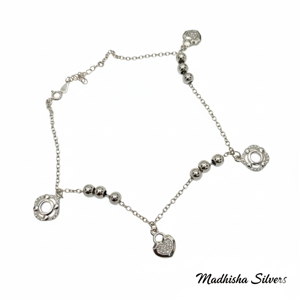 Women's sterling silver beaded anklet with charms.