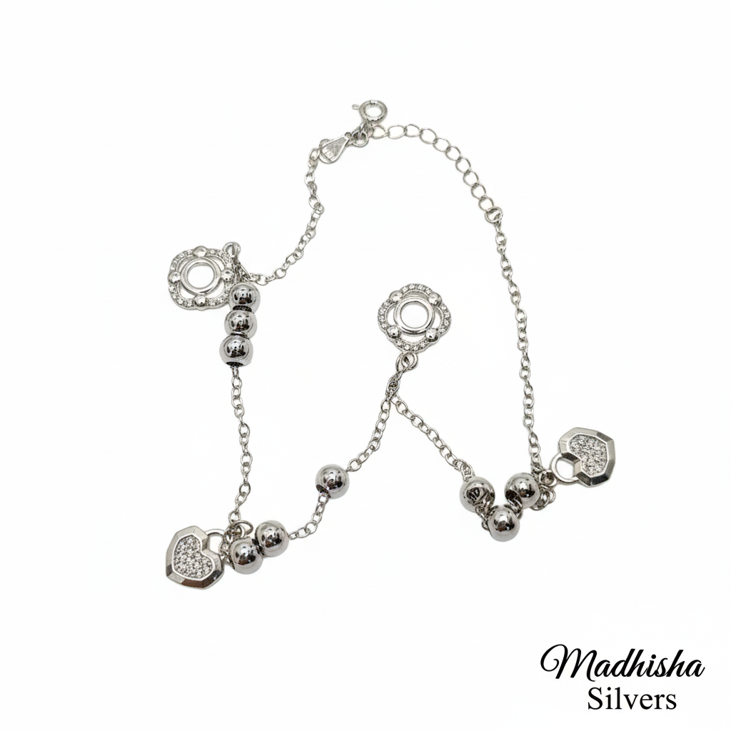 Women's sterling silver beaded anklet with charms.