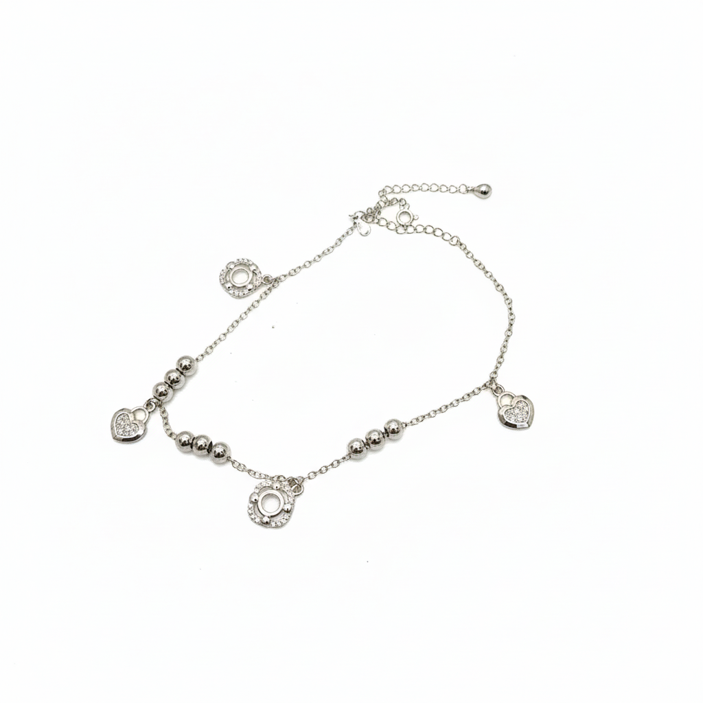 Madhisha Silvers single piece silver anklet with beads, crystal hearts, and circle charms, adjustable fit.