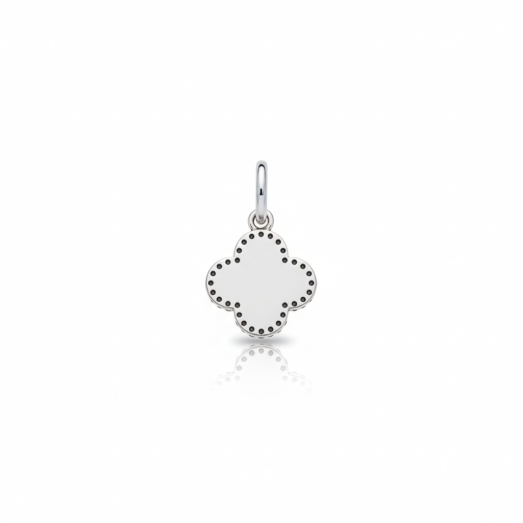 Sterling silver evil eye charm with white enamel and clover shape.