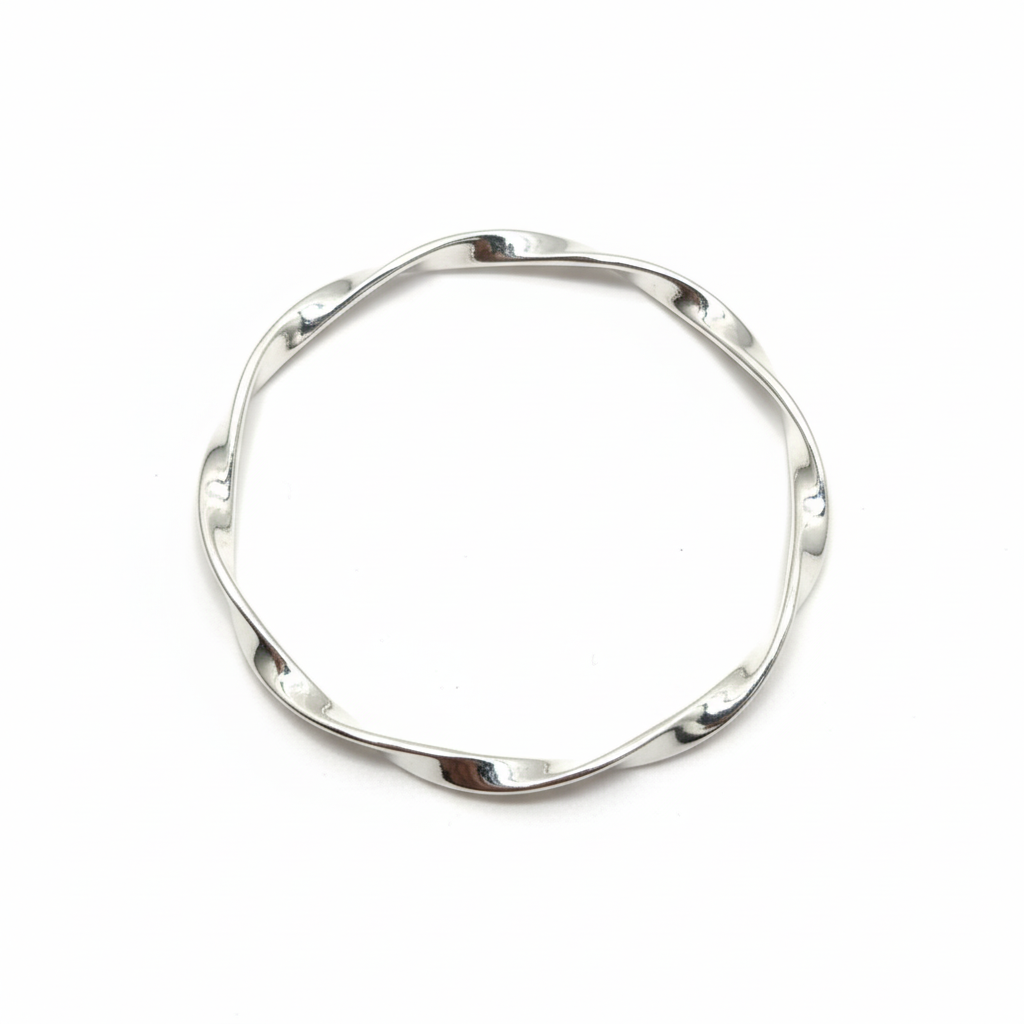 The Twisted Tempo 925 Sterling Silver Unisex Kada, close-up centered view by Madhisha Silvers.