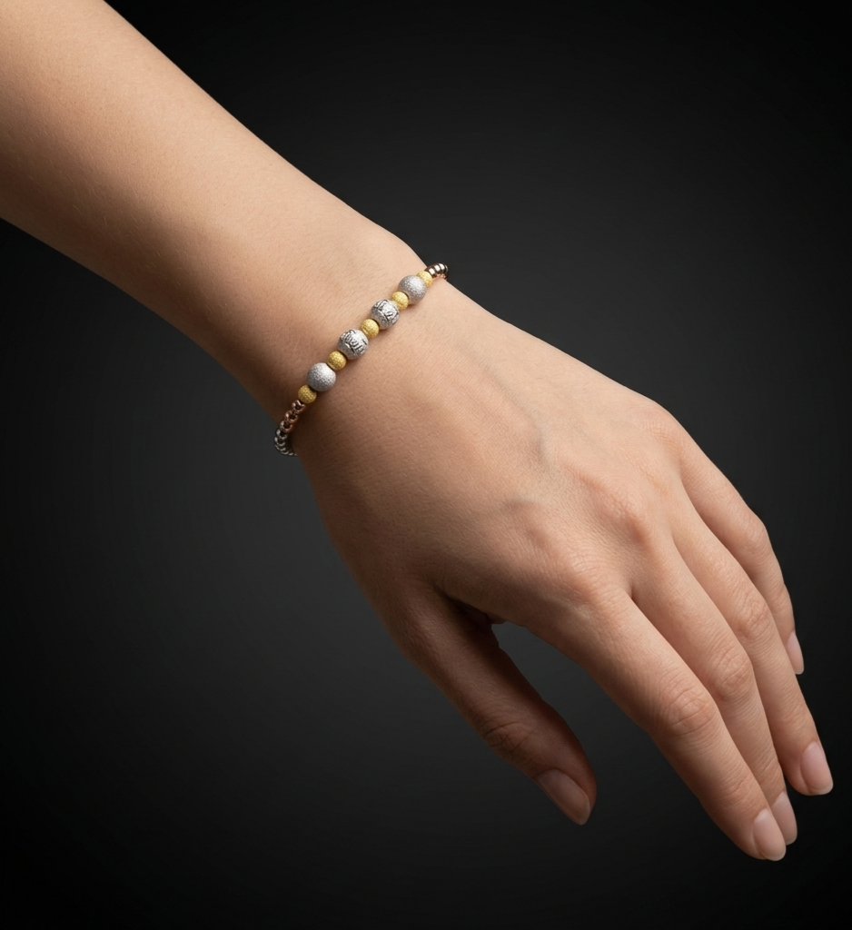 Heritage Rolo silver bracelet with gold and silver textured bead accents, crafted in 925 sterling silver for everyday elegance