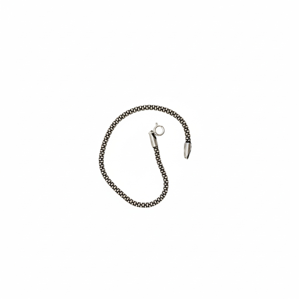 Madhisha Silvers sleek woven sterling silver bracelet, fluid foxtail pattern chain.