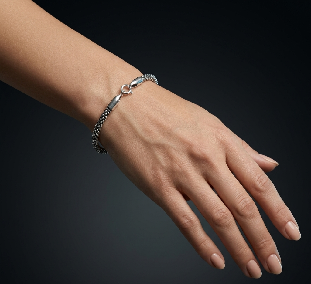 Elegant Silver Viper bracelet crafted in 925 sterling silver with a sophisticated snake-inspired woven design