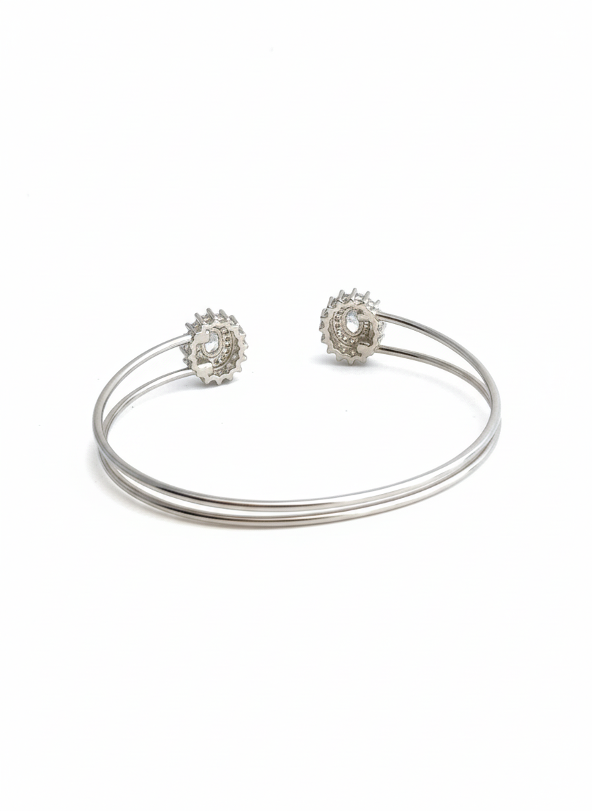 Close-up of the Madhisha Silvers Sterling Silver Kada showing the Round Cubic Zirconia Sunburst/Halo Setting