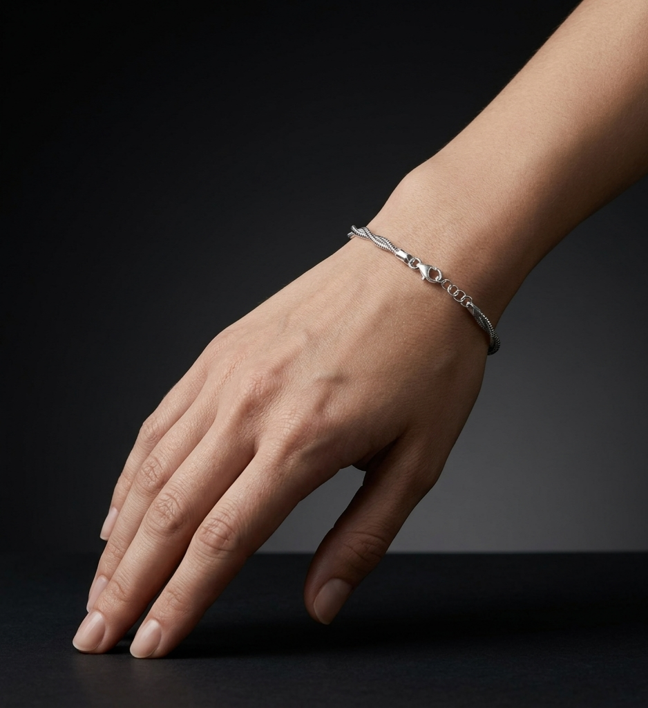 Silver Spiral sterling silver bracelet featuring an intricate braided spiral pattern, crafted for timeless elegance and everyday wear