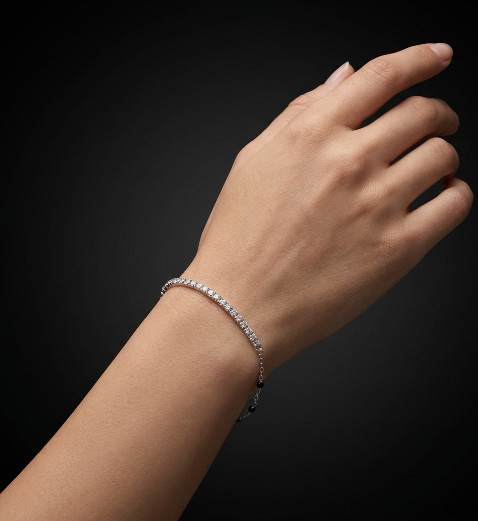 Eclipse Glow 925 sterling silver bracelet with sparkling stones elegantly worn on a woman's wrist against a dark luxury background