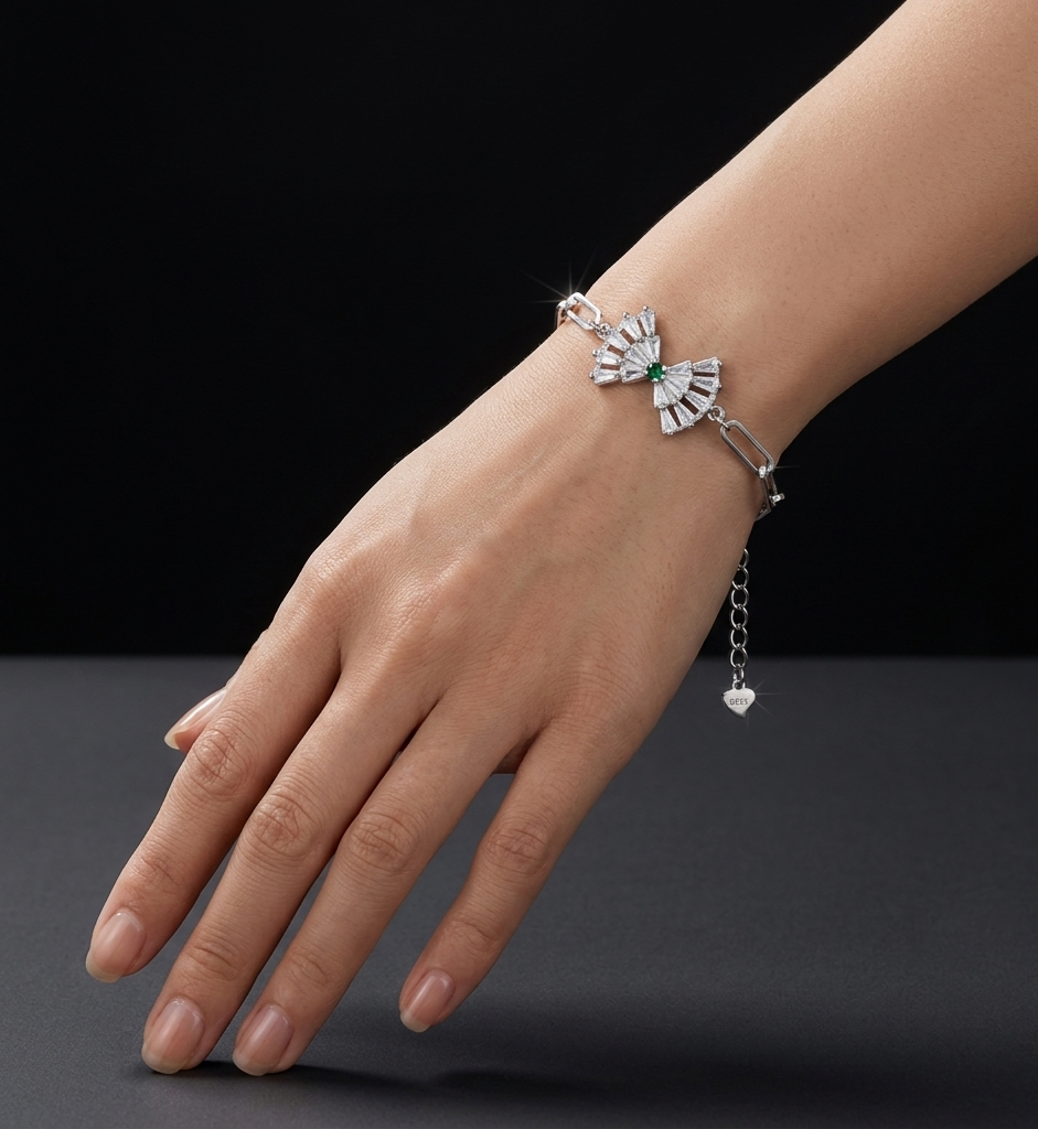 Link CZ 925 sterling silver bracelet featuring a sparkling fan-shaped cubic zirconia centerpiece with elegant link chain detailing, worn on a woman's wrist