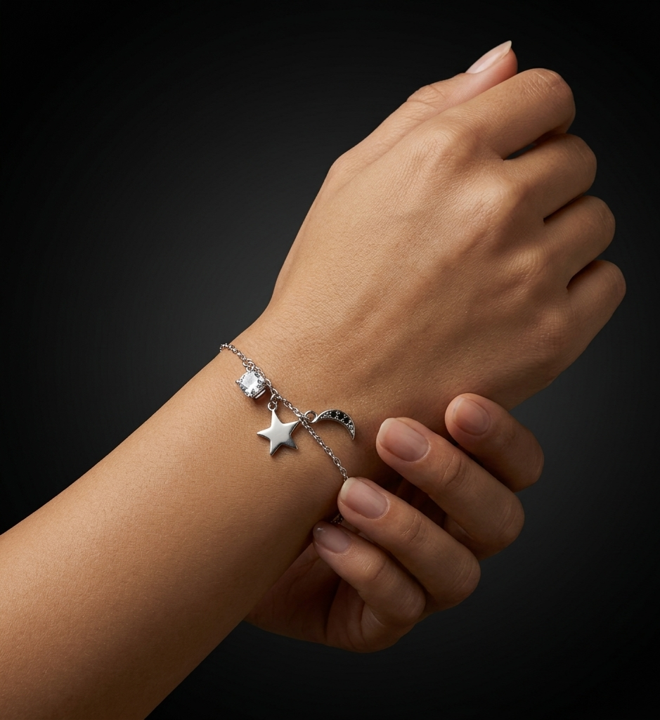 Starlit Moon 925 sterling silver bracelet with celestial-inspired star, moon, and crystal charms, styled on a woman's wrist against a dark luxury background