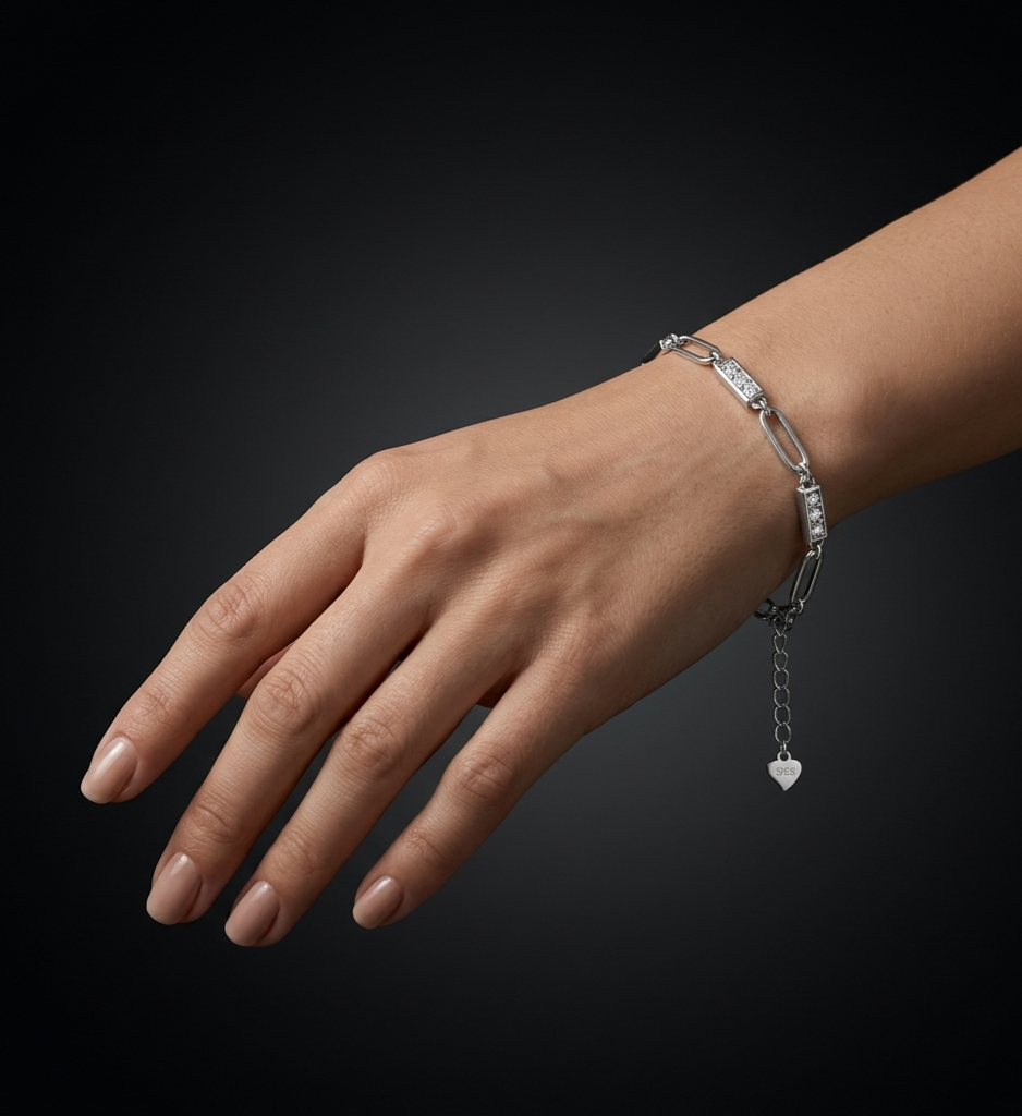 Elara Silver 925 sterling silver bracelet featuring sparkling crystal-set rectangular links and elegant chain detailing, worn on a woman's wrist